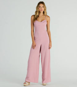 The Effortless Allure Lace-Up Woven Wide-Leg Jumpsuit is an elevated one-piece that blends sleek sophistication with playful charm, perfect for nailing casual or formal outfits.