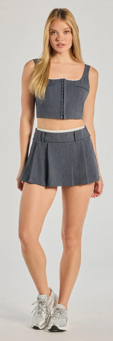 Effortlessly create party outfits or vacation-ready looks with the Keep It Casual Pleated Mini Skort, one part of a versatile women's charcoal matching set perfect for quick and easy outfit combinations from layering chic outfits to transitioning your look seamlessly.