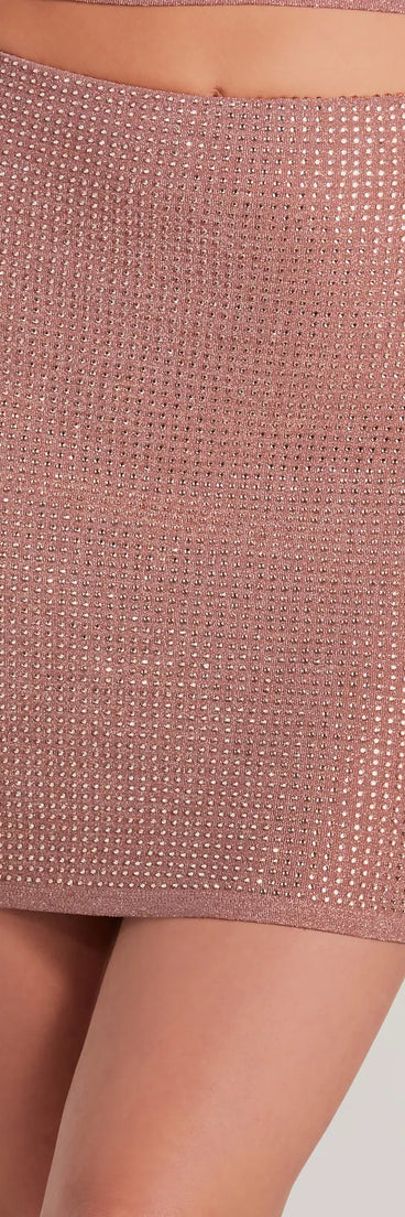 The Holiday Hottie Glitter Bodycon Mini Skirt is a trendy women's bottom in rose, designed with modern details and alluring textures to complete chic outfits for 2025.
