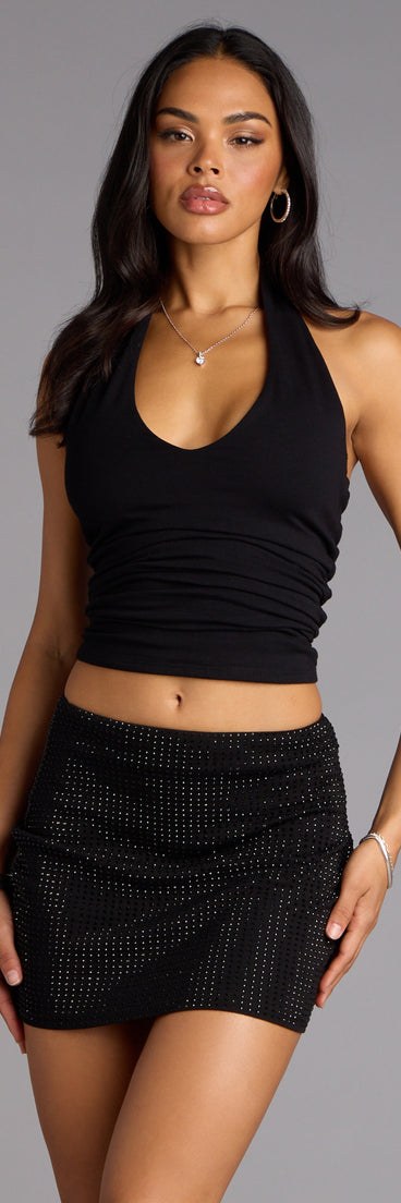 Make a fall statement in the Glitzy Sheen Rhinestone Knit Mini Skirt, a closet must-have among fall bottoms for women.