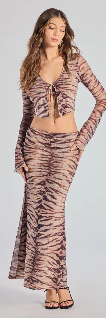 Serve effortless style and scroll-stopping energy in the Strut It Out Abstract Zebra Maxi Skirt, part of a brown matching clothing set that does the work for you with bold, polished vibes from top to bottom.