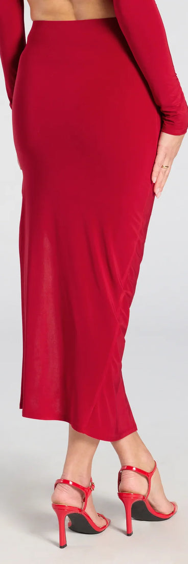 The Bold Staple Ruched Asymmetrical Midi Skirt is a trendy women's bottom in red, designed with modern details and alluring textures to complete chic outfits for 2025.