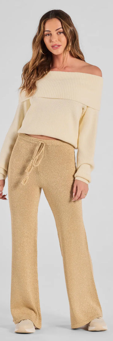 The Cozy Luxe Lurex Knit Pants is a trendy women's bottom in gold, designed with modern details and alluring textures to complete chic outfits for 2025.