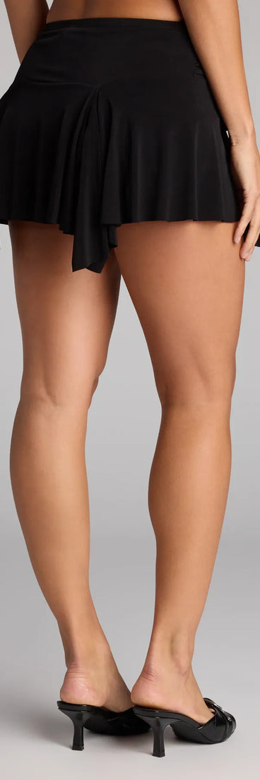 Style up your rotation with the Serving Moves Ruched Hanky Hem Mini Skort, a trendy black skort made to anchor every outfit with attitude and ease.