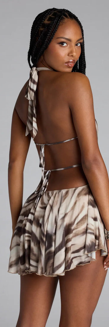 Designed for campus outfits, sleek workwear, and on-the-go moments, the Wild Moves Only Halter Open Back Romper is a trendy natural bottom for women bringing effortless fall versatility.