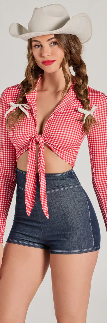 Perfect as a dress alternative for a New Year's outfit, wedding guest attire, and cocktail party dress alike, the Rodeo Cowgirl Gingham Tie-Front Romper is a women's red romper that combines a stylish, unique design with festive colors and holiday-ready details for a standout look!