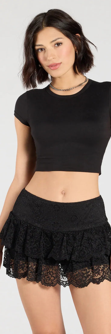 Create bold, fashion-forward looks for summer with the Flirty Feels Ruffled Lace Mini Skort in black, a must-have piece from Windsor’s collection of stylish bottoms for women.