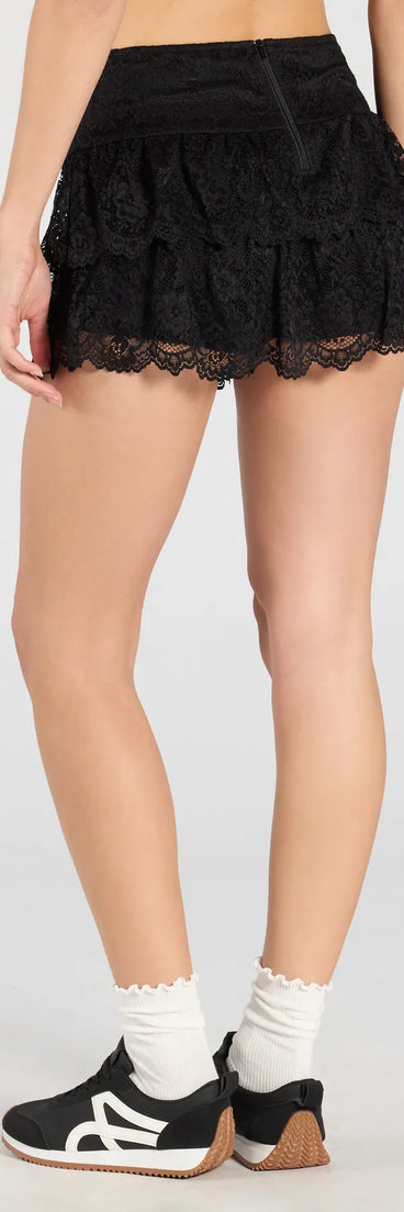 Designed for campus outfits, sleek workwear, and on-the-go moments, the Flirty Feels Ruffled Lace Mini Skort is a trendy black bottom for women bringing effortless fall versatility.