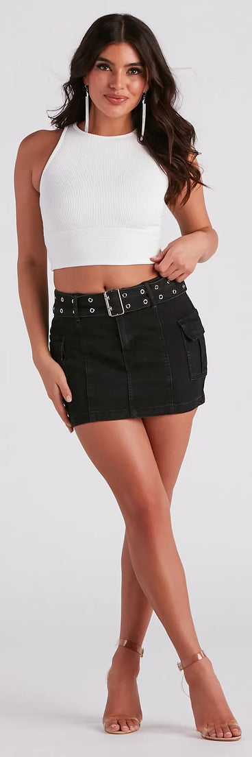 The Cute And Trendy Cargo Mini Skirt is a black cargo skirt, an effortlessly layer-friendly piece ideal for a celebration-ready look with a funtional-inspired flair.