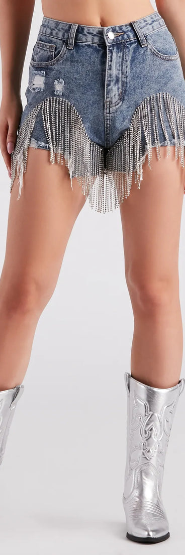 The On The Fringe Rhinestone Denim Shorts is a trendy women's bottom in medium denim wash, designed with modern details and alluring textures to complete chic outfits for 2025.