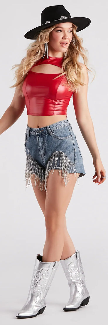 The On The Fringe Rhinestone Denim Shorts is a trendy women's bottom in medium denim wash, designed with modern details and alluring textures to complete chic outfits for 2025.