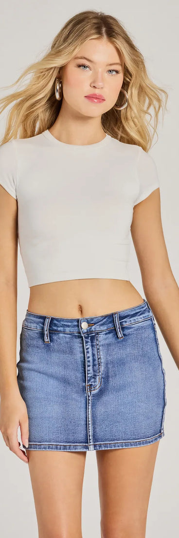 Designed for campus outfits, sleek workwear, and on-the-go moments, the Total Perfection Mid Rise Denim Mini Skort is a trendy dark denim wash bottom for women bringing effortless fall versatility.