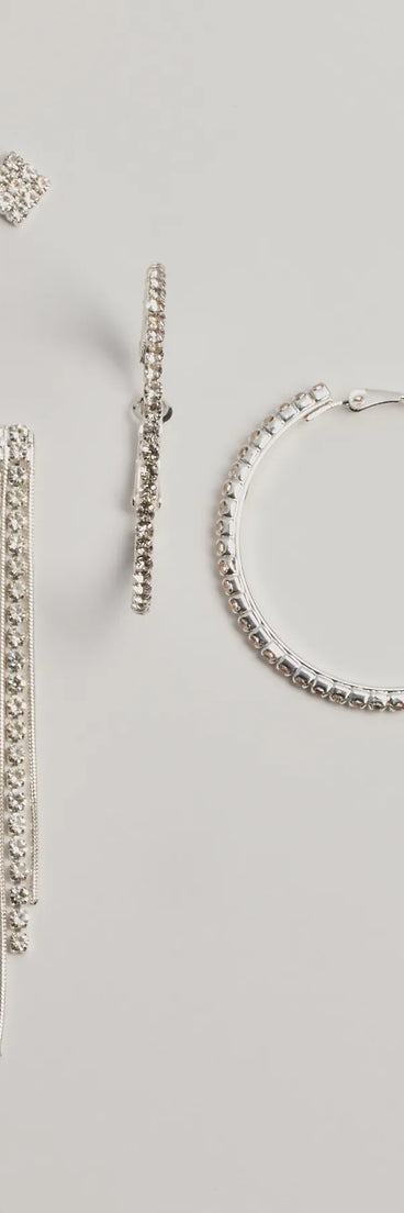 Get ready for any event with the Time To Shine Rhinestone Three-Pack Earring Set in silver, an essential start to creating a versatile outfit for women for parties, cocktail hours, or Valentine's Day events.