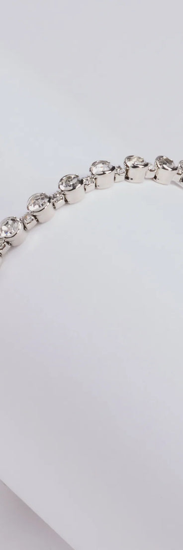 The Timelessly Luxe Rhinestone Memory Wire Bracelet helps create a chic silver women's cocktail outfit with a trendy texture and stylish design, ideal for wedding guest cocktail outfits or dinner parties.