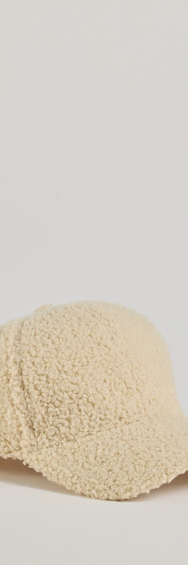 Add a touch of seasonal charm to your winter wardrobe with the Toasty Vibes Faux Sherpa Baseball Cap, a ivory cold-weather accessory that effortlessly completes your seasonal looks!