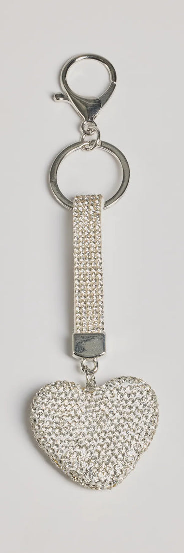 Upgrade your style game for 2025 with the Shimmering Rhinestone Heart Bag Charm in silver, perfect for any fashion-forward wardrobe.