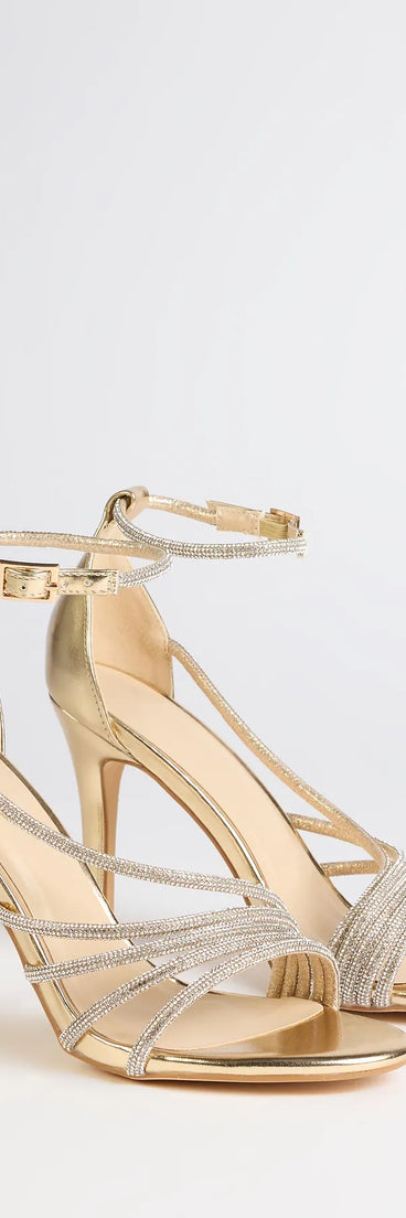 Elevate warm-weather looks with Radiant Night Rhinestone Metallic Stiletto Heels in gold, a pair of trendy sandals bringing chic, modern flair to every step.