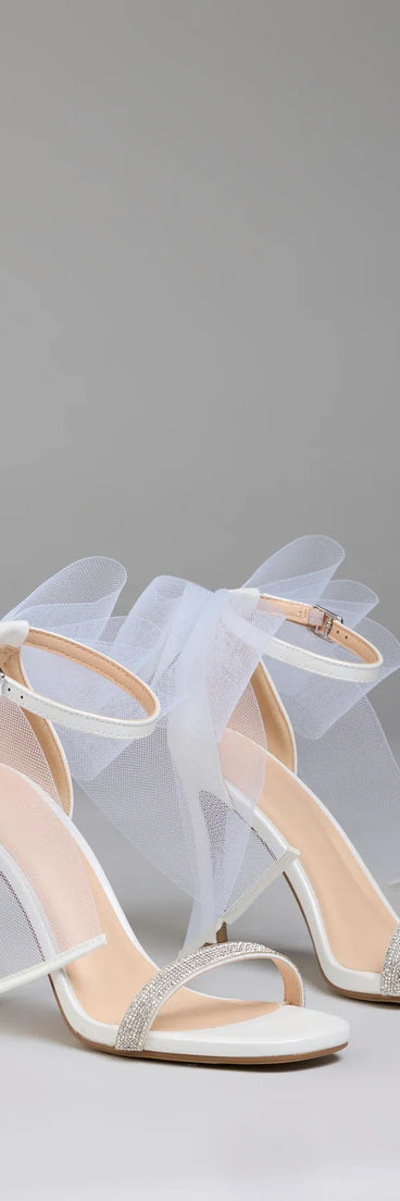 Step into style with the Tied With A Bow Stiletto Heels, white heels made to complete your Windsor look with comfort and glam in mind.