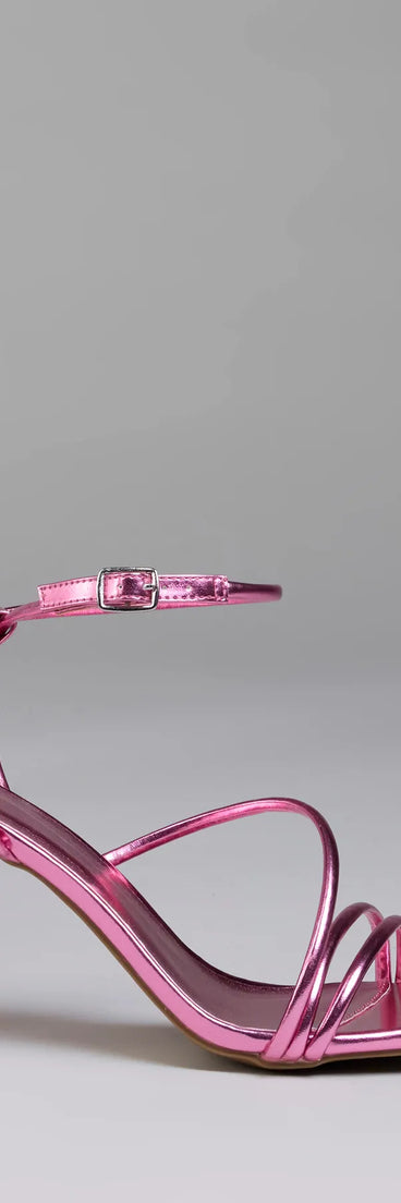 Elevate warm-weather looks with Edgy Elegance Metallic Strappy Stiletto Heels in pink, a pair of trendy sandals bringing chic, modern flair to every step.