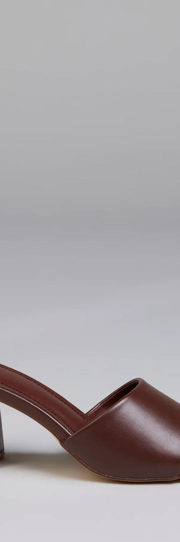 Elevate warm-weather looks with Chic Flair Square Toe Block Heel Mules in brown, a pair of trendy sandals bringing chic, modern flair to every step.