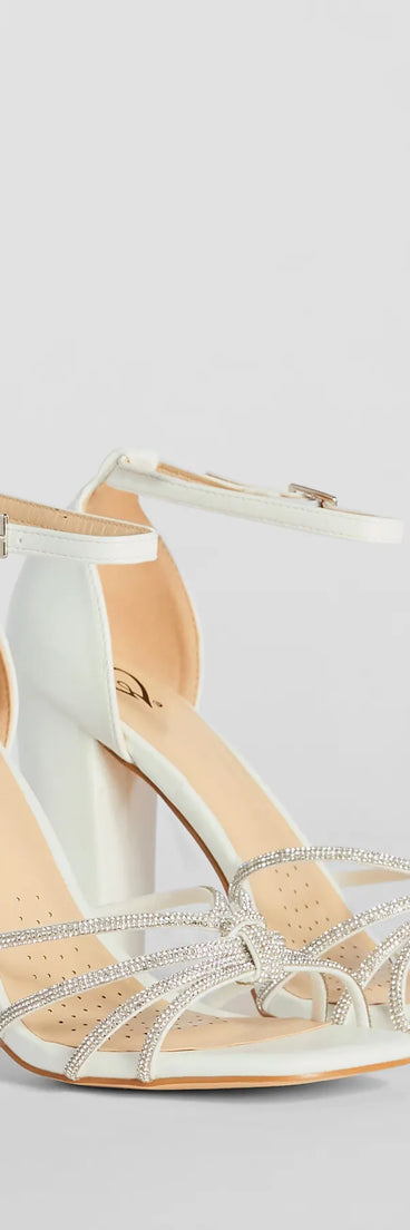 Step into style with the Sparkle Scene Rhinestone Strappy Faux Leather Block Heels, white heels made to complete your Windsor look with comfort and glam in mind.