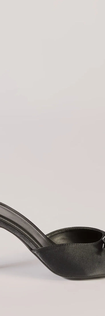 Elevate your work wardrobe with the Chic Elegance Faux Leather Stiletto Bow Mules in black, a versatile women's shoe perfect for the office; that combines style with comfort for seamless desk-to-dinner transitions.