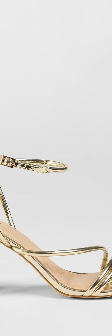 Elevate warm-weather looks with Get That Glow Metallic Block Heels in gold, a pair of trendy sandals bringing chic, modern flair to every step.