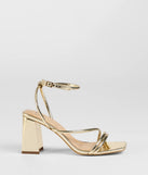 Elevate warm-weather looks with Get That Glow Metallic Block Heels in gold, a pair of trendy sandals bringing chic, modern flair to every step.