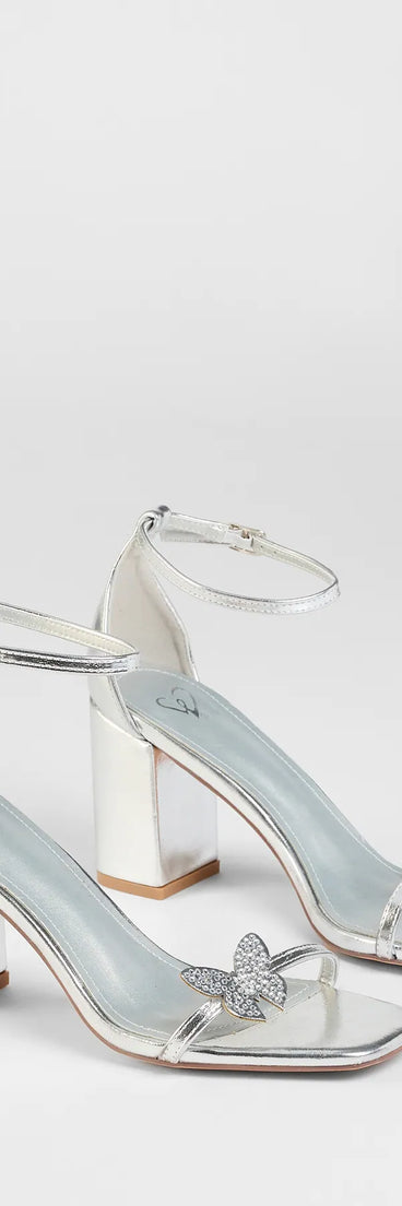 Step into style with the Fly Girl Butterfly Metallic Block Heels, silver heels made to complete your Windsor look with comfort and glam in mind.