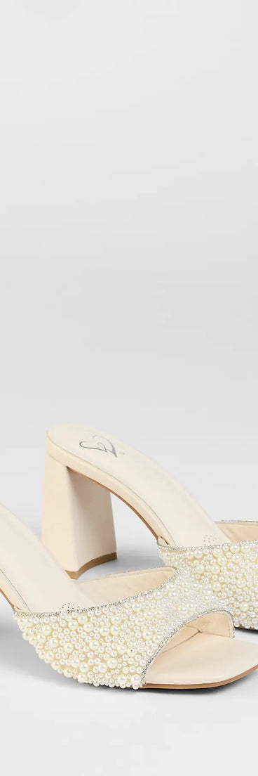 Step into style with the Classy And Cute Faux Pearl Block Heels, ivory heels made to complete your Windsor look with comfort and glam in mind.