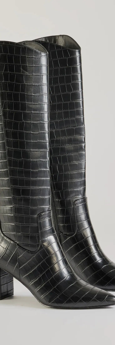 The Bold Statement Faux Leather Croc-Embossed Under the Knee Boots are women's black shoes for work, featuring a sleek silhouette and cushioned sole for all-day comfort, and are a trendy choice for professional or business casual outfits.