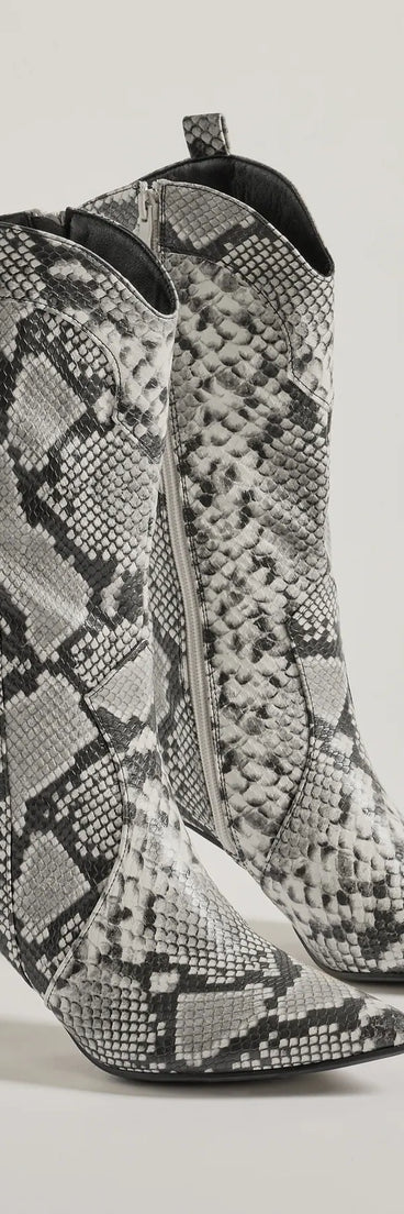 Sassy Aura Faux Leather Stiletto Snake Boots, a trendy snake print addition to women's going-out outfits, is ideal for Christmas party outfits, chic NYE attire, or winter night-out looks that keep you on-trend!