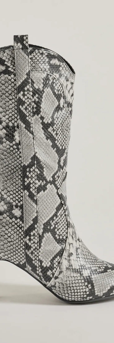 Sassy Aura Faux Leather Stiletto Snake Boots, a trendy snake print addition to women's going-out outfits, is ideal for Christmas party outfits, chic NYE attire, or winter night-out looks that keep you on-trend!