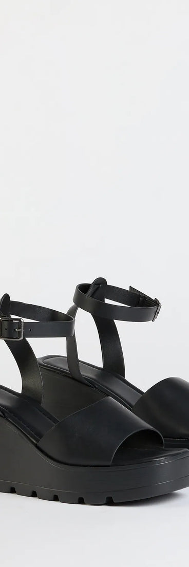 Elevate warm-weather looks with 90s Wish Platform Wedges in black, a pair of trendy sandals bringing chic, modern flair to every step.
