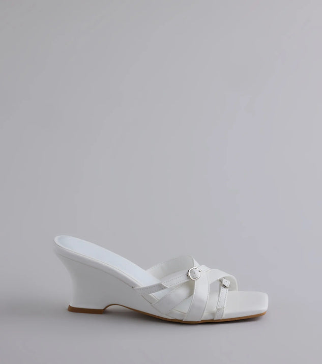 Turn heads in the Playing It Cute Strappy Buckle Wedge Heels, white heels showcasing a fresh trend or stylish detail made to elevate your full Windsor fit.