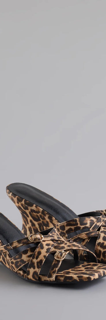 Step into style with the Playing It Cute Strappy Buckle Wedge Heels, leopard print heels made to complete your Windsor look with comfort and glam in mind.