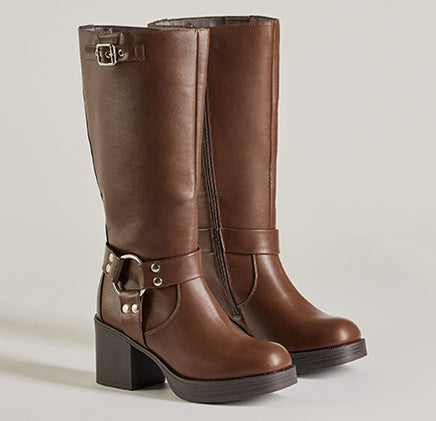 Discover versatile women's boots designed for style and comfort, featuring knee-high and heeled options perfect for any season.