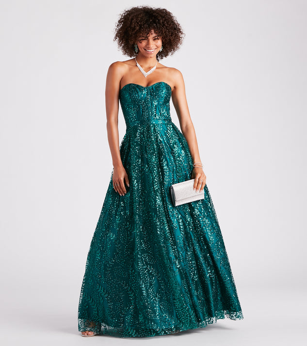 Ivy Glitter Corset Strapless Ball Gown is the perfect prom dress pick with on-trend details to make the 2024 dance your most memorable event yet!