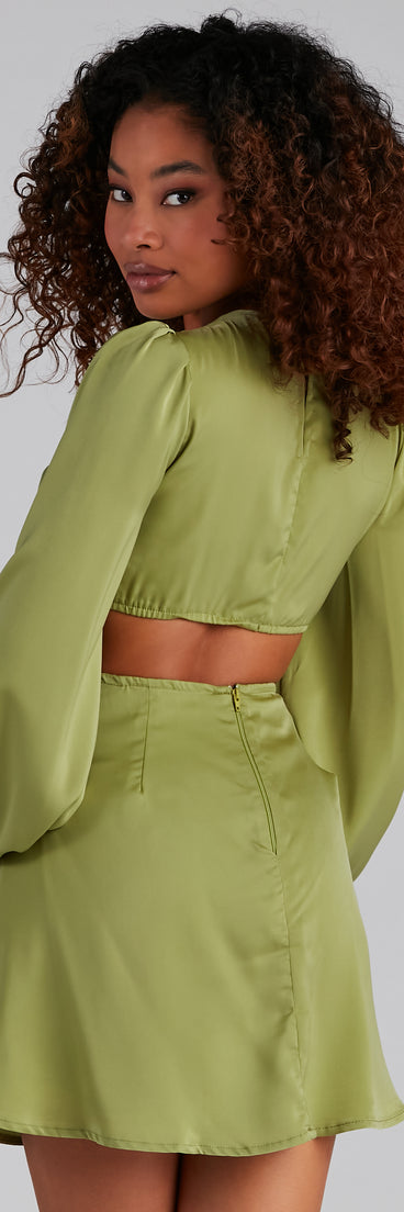 So Luxe Satin A-Line Cutout Mini Dress creates the perfect spring wedding guest dress or cocktail attire with stylish details in the latest trends for 2023!