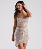 Holiday Glow Sequin Cutout Dress creates the perfect spring wedding guest dress or cocktail attire with stylish details in the latest trends for 2023!