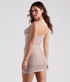 Holiday Glow Sequin Cutout Dress creates the perfect spring wedding guest dress or cocktail attire with stylish details in the latest trends for 2023!