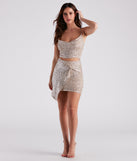 Holiday Glow Sequin Cutout Dress creates the perfect spring wedding guest dress or cocktail attire with stylish details in the latest trends for 2023!