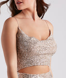 Holiday Glow Sequin Cutout Dress creates the perfect spring wedding guest dress or cocktail attire with stylish details in the latest trends for 2023!