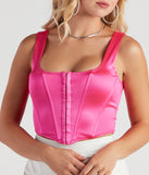 With fun and flirty details, Spotlight On Pink Satin Crop Bustier shows off your unique style for a trendy outfit for the fall season!