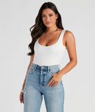 The tucked-in look of the Staple Piece Scoop Neck Bodysuit creates a polished look and with fab details brings a distinct style to your outfit.