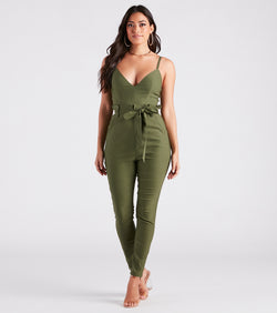 The Straight To Business V-Neck Paper Bag Jumpsuit is an elevated one-piece that blends sleek sophistication with playful charm, perfect for nailing casual or formal outfits.