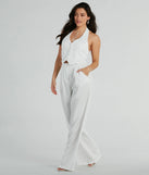 The Getaway Vibes Wide-Leg Pinstripe Woven Jumpsuit is an elevated one-piece that blends sleek sophistication with playful charm, perfect for nailing casual or formal outfits.