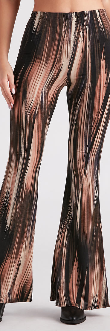 Refresh your fall closet with stylish women's pants like the Festival Muse Printed Flare Pants in a sleek fabric and a pant leg style that makes your look unique.