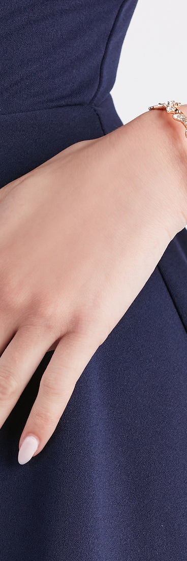 With Enchanted Glamour Rhinestone Butterfly Cuff as your homecoming jewelry or accessories, your 2023 Homecoming dress look will be fire!