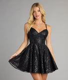 Feel ready for every dance floor moment or feed-worthy reel in the Linda Lace-Up Glitter Sequin Skater Party Dress, a homecoming dress designed to own your moment.
